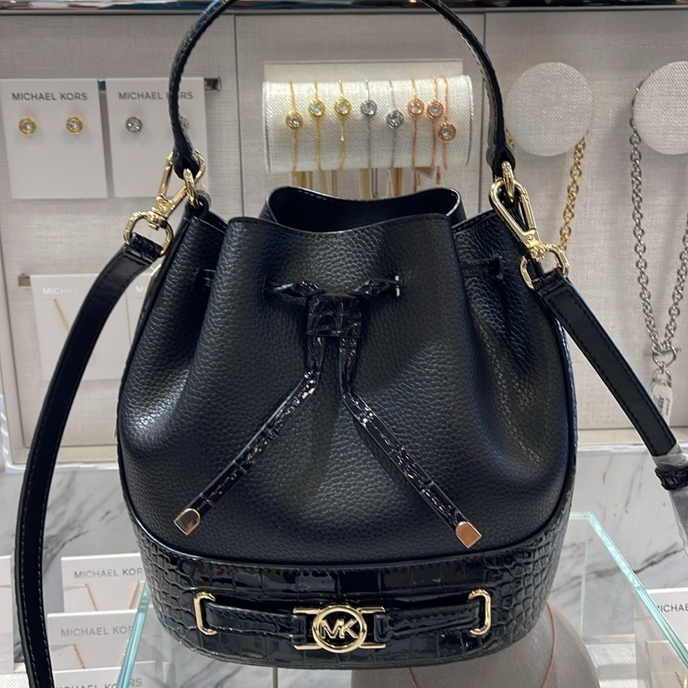 MICHAEL KORS 
Reed Medium Pebbled Leather Belted Bucket Messenger Satchel Crossb